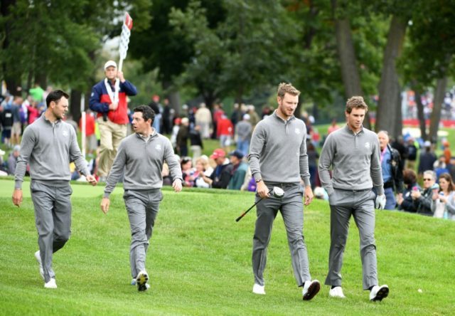 Martin Kaymer, Rory McIlroy, Chris Wood and Thomas Pieters of Europe walk during practice
