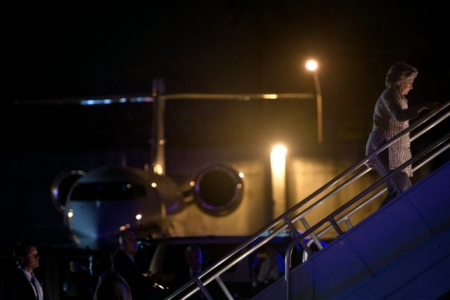 Democratic presidential nominee Hillary Clinton boards her plane at Miami International Ai