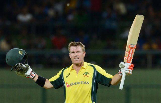 Australia's David Warner celebrates after scoring a century against Sri Lanka in Pallekele