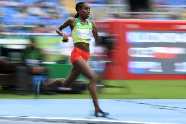 Ethiopia's Almaz Ayana sliced nearly 14 seconds off the previous world 10,000m best when s