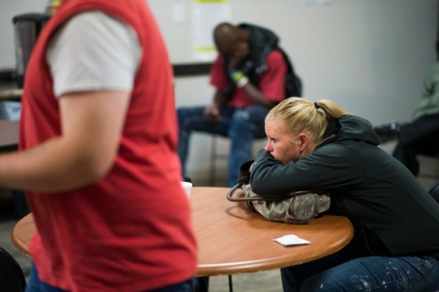 Heather Scallion waits for a job at the Command Center temporary employment agency in Will