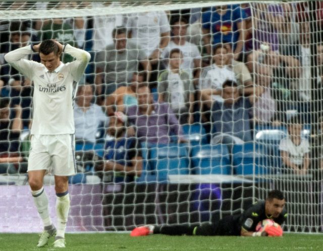 Real Madrid's Portuguese forward Cristiano Ronaldo gestures after missing a goal during th