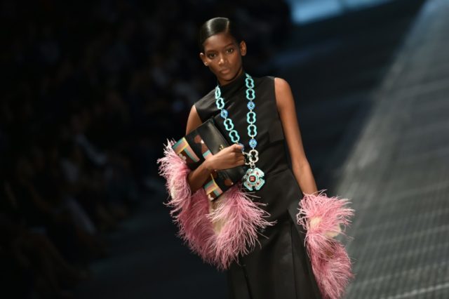 A model presents a creation for fashion house Prada