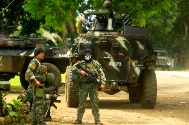 Philippine soldiers prepare for an operation against the extremist Abu Sayyaf group on Sep