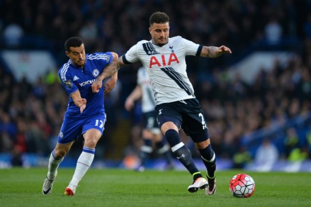 Tottenham defender Kyle Walker (R) holds off Chelsea midfielder Pedro during the English P