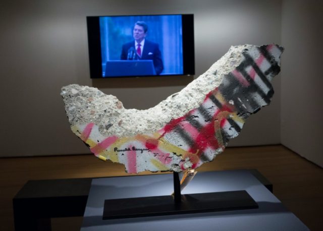 A signed fragment of the Berlin Wall is among the items from the private collection of for