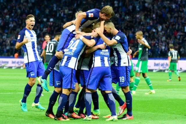 Hertha Berlin's team celebrates after scoring during the German first division Bundesliga