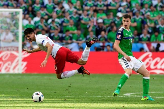 Northern Ireland's Paddy McNair (R) had their best chance of the first half against the Cz