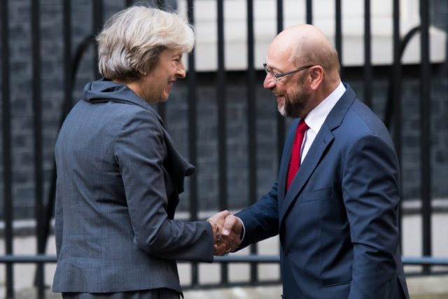 British Prime Minister Theresa May (L) greets President of the European Parliament Martin