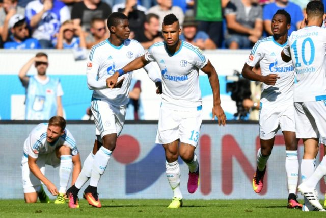 Schalke's striker Eric Maxim Choupo-Moting (C) celebrates scoring against Hoffenheim on Se