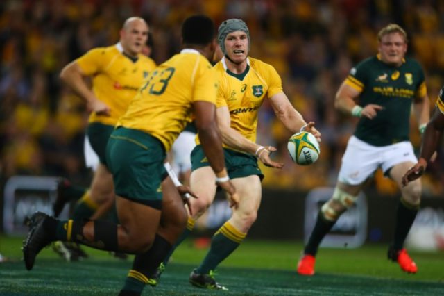 South Africa led 14-13 at half-time, but Australia dominated the second period and pulled
