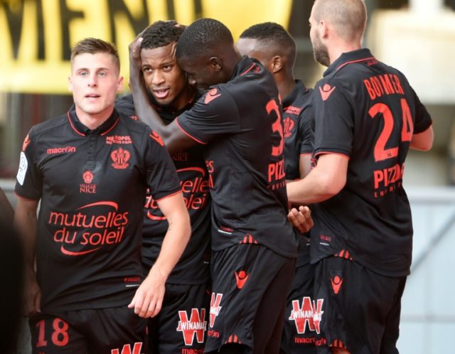 Nice's players celebrate after scoring against Nancy on September 25, 2016