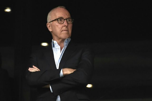 Frank McCourt watched his future employees eke out a drab 0-0 draw with Lyon at the Stade