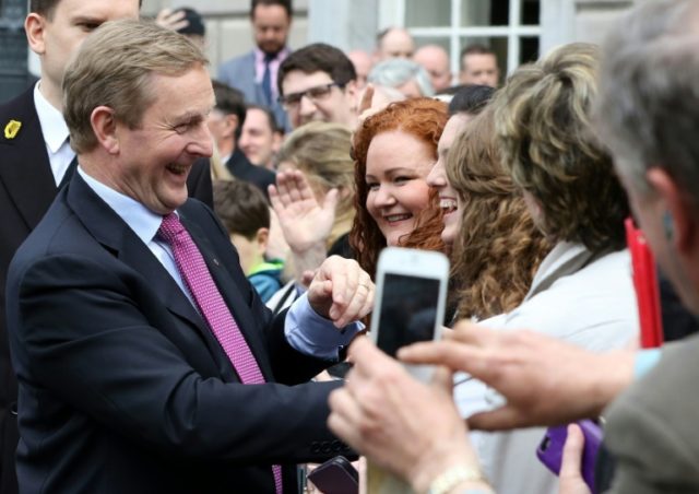 Irish Prime Minister and Fine Gael party leader, Enda Kenny, (L) heads a minority governme