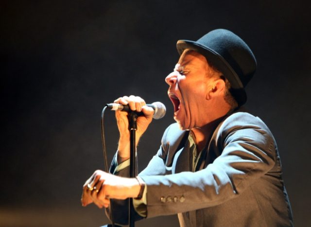 Tom Waits performs during a concert at the Paris Grand Rex concert hall in July 2008