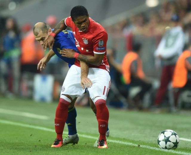 Bayern will be without Brazil winger Douglas Costa (R), who has been ruled out for the for