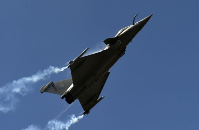 India, the world's top defence importer, signed a deal to buy 36 Rafale fighter jets from