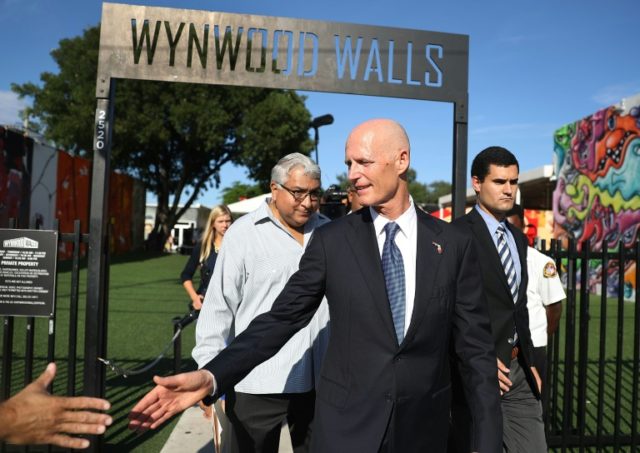 Florida Governor Rick Scott visits Wynwood, which was where the first US outbreak of local