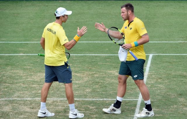 Australia's John Peers (L) and Sam Groth celebrate their win against Slovakia's Andrej Mar