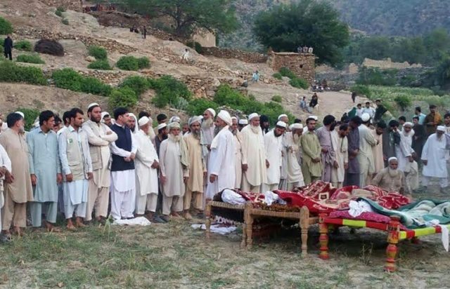 Pakistani mourners gather for the funeral of victims of a sucide bombing in Bajaur Agency