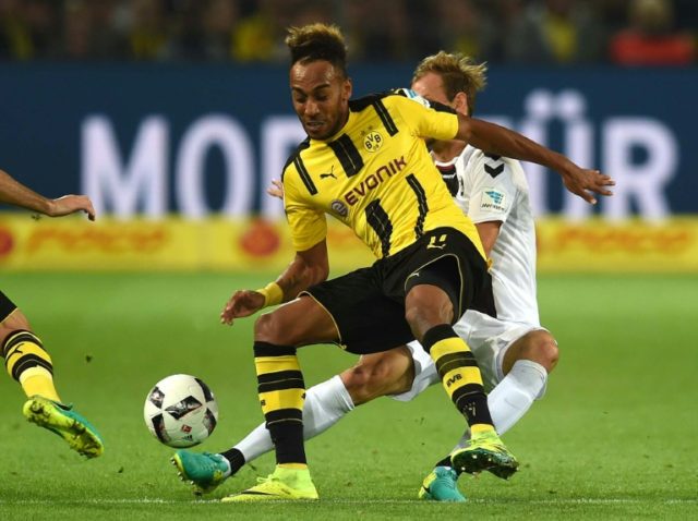 Dortmund's striker Pierre-Emerick Aubameyang and Freiburg´s striker Philipp vie for the