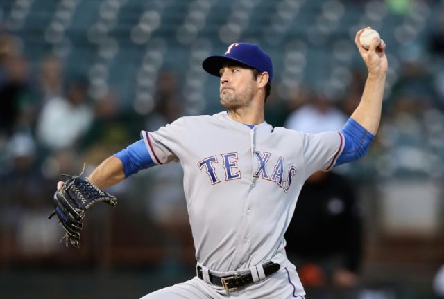 Cole Hamels of the Texas Rangers improved to 15-5, allowed six hits, struck out seven and