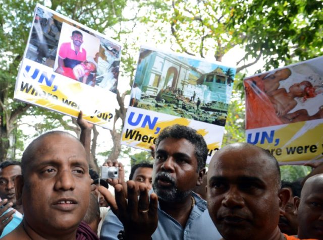 Sri Lankan nationalists demonstrate outside the UN compound in Colombo on September 1, 201