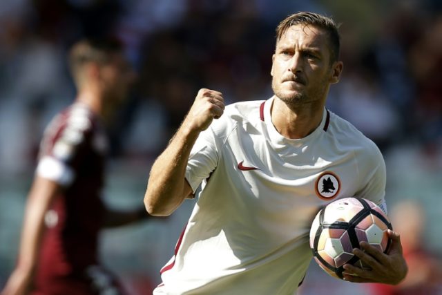 AS Roma's forward Francesco Totti celebrates after scoring a goal during the Italian Serie