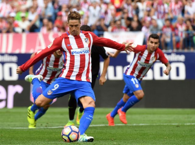 Fernando Torres netted twice in Atletico's 5-0 thrashing of Sporting Gijon on Saturday