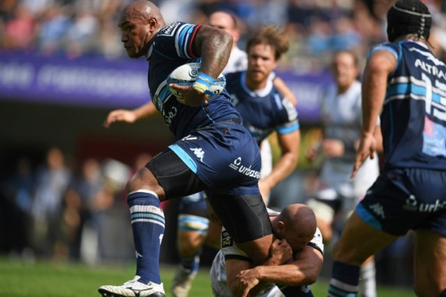 Montpellier's Fijian winger Nemani Nadolo (left) runs with the ball during the French Top1
