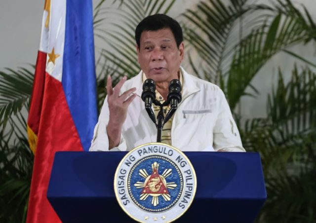Philippine President Rodrigo Duterte speaks to reporters in Davao City, on the southern is