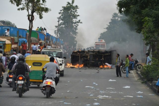Some 15,000 police officers have been deployed to the streets of Bangalore to enforce a cu