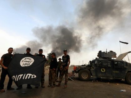 Iraqi forces pushed the Islamic State group out of Qayyarah, considered strategic for a planned offensive against the jihadists' last Iraqi stronghold of Mosul