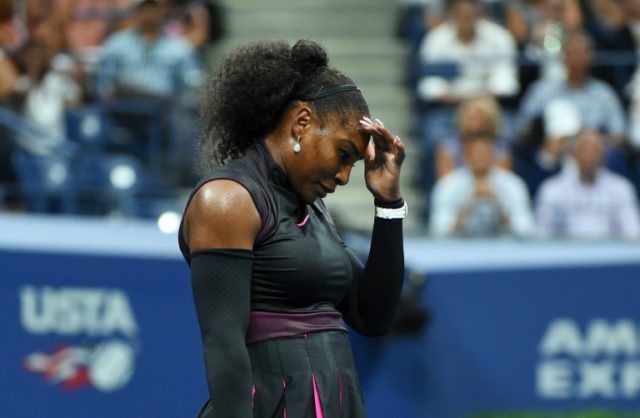 Serena Williams of the US reacts after losing a point against Karolina Pliskova of Czech R