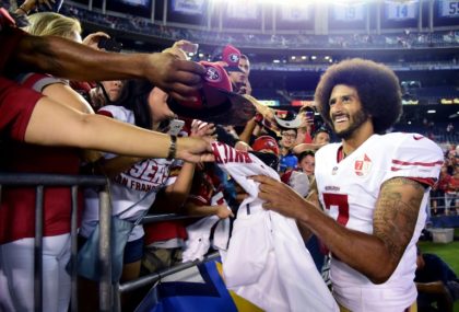 Colin Kaepernick signs autographs for fans after the San Francisco 49ers' 31-21 win over t