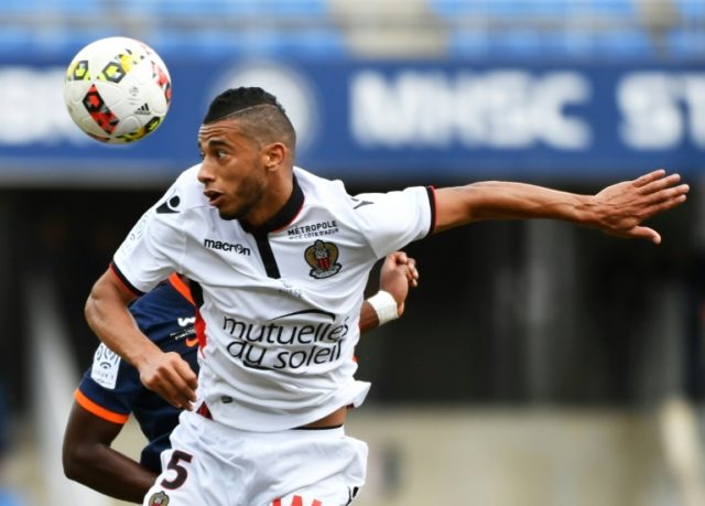 Nice's midfielder Younes Belhanda eyes the ball during a French L1 football match against
