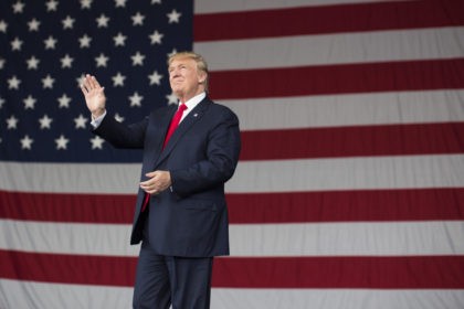 Republican presidential candidate Donald Trump arrives to speak to a campaign rally, Monda