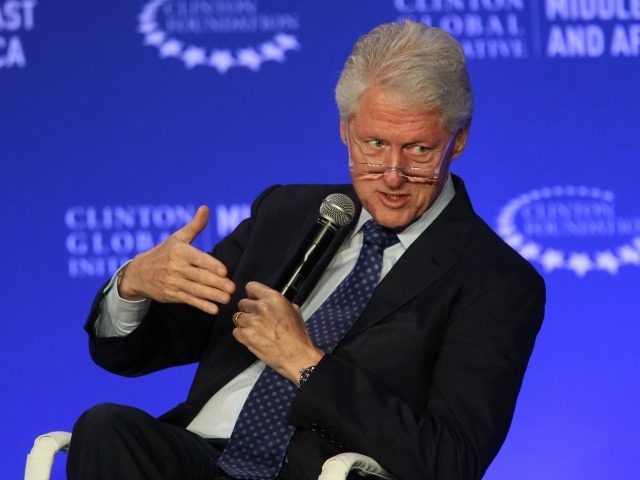In this May 6, 2015, photo, former U.S President Bill Clinton speaks during a plenary sess