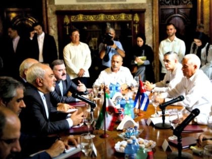 Iranian Foreign Minister Mohammad Javad Zarif, left, talks to Cuban Foreign Minister Bruno