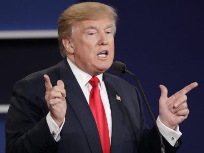 Donald Trump points at debate (John Locher / Associated Press)