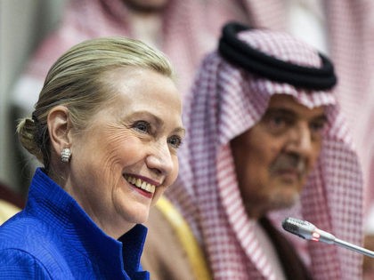 US Secretary of State Hillary Clinton smiles during a joint press conference with Saudi Fo