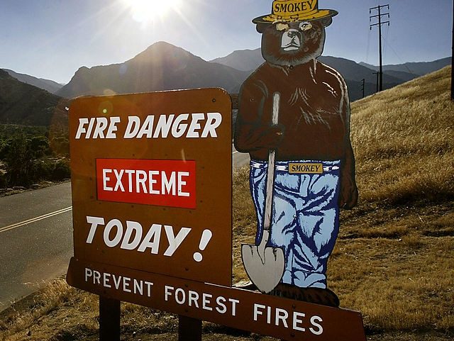 SEQUOIA NATIONAL FOREST, CA - JULY 30: A sign warning of today's extremely dangerous fire hazard conditions stands near a forest recovering from the massive McNally fire of July 2002 on July 30, 2004 in Sequoia National Forest in the Sierra Nevada Mountains of California. The Bush administration is pushing …