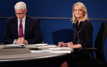 ST LOUIS, MO - OCTOBER 09: Moderator Anderson Cooper of CNN (L) and moderator Martha Radd