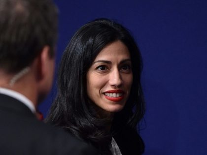 Huma Abedin, political staffer and aide to Democratic presidential candidate Hillary Clinton, is seen following the second presidential debate at Washington University in St. Louis, Missouri on October 9, 2016. / AFP / Paul J. Richards (Photo credit should read PAUL J. RICHARDS/AFP/Getty Images)