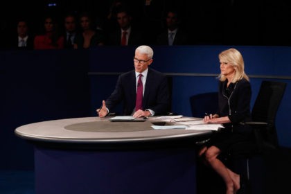 ST LOUIS, MO - OCTOBER 09: Moderator Anderson Cooper of CNN (L) speaks as moderator Marth