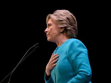 Democratic presidential nominee Hillary Clinton pauses while speaking during a fundraiser at the Paramount Theater on October 14, 2016 in Seattle, Washington. / AFP / Brendan Smialowski (Photo credit should read BRENDAN SMIALOWSKI/AFP/Getty Images)