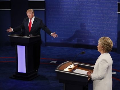 Republican presidential nominee Donald Trump speaks as Democratic presidential nominee Hil