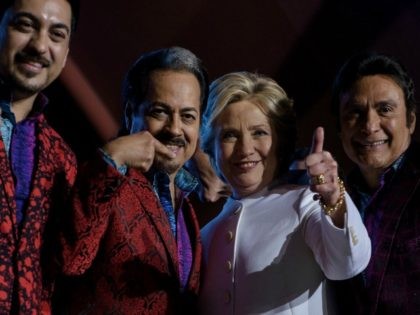 Democratic presidential nominee Hillary Clinton stands with supporters at Craig Ranch Regi