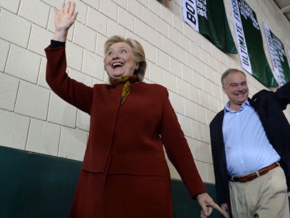 TOPSHOT - Democratic presidential nominee Hillary Clinton attends a campaign event with her running mate Tim Kaine, October 22, 2016 at Taylor Allderdice High School in Pittsburgh, Pennsylvania. / AFP / Robyn Beck (Photo credit should read ROBYN BECK/AFP/Getty Images)