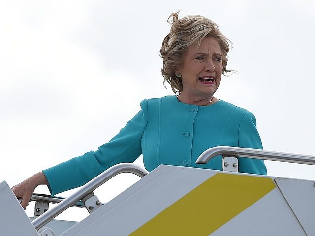 Democratic presidential nominee Hillary Clinton arrives at Palm Beach International Airport for a day of campaign in Palm Beach, Florida, October 26, 2016. / AFP / Robyn BECK (Photo credit should read ROBYN BECK/AFP/Getty Images)